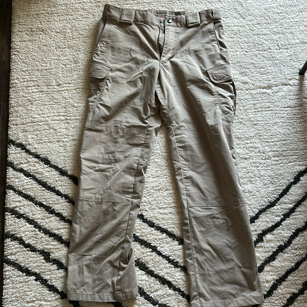 Men’s tan tactical pants. Brand: 5.11 Tactical
